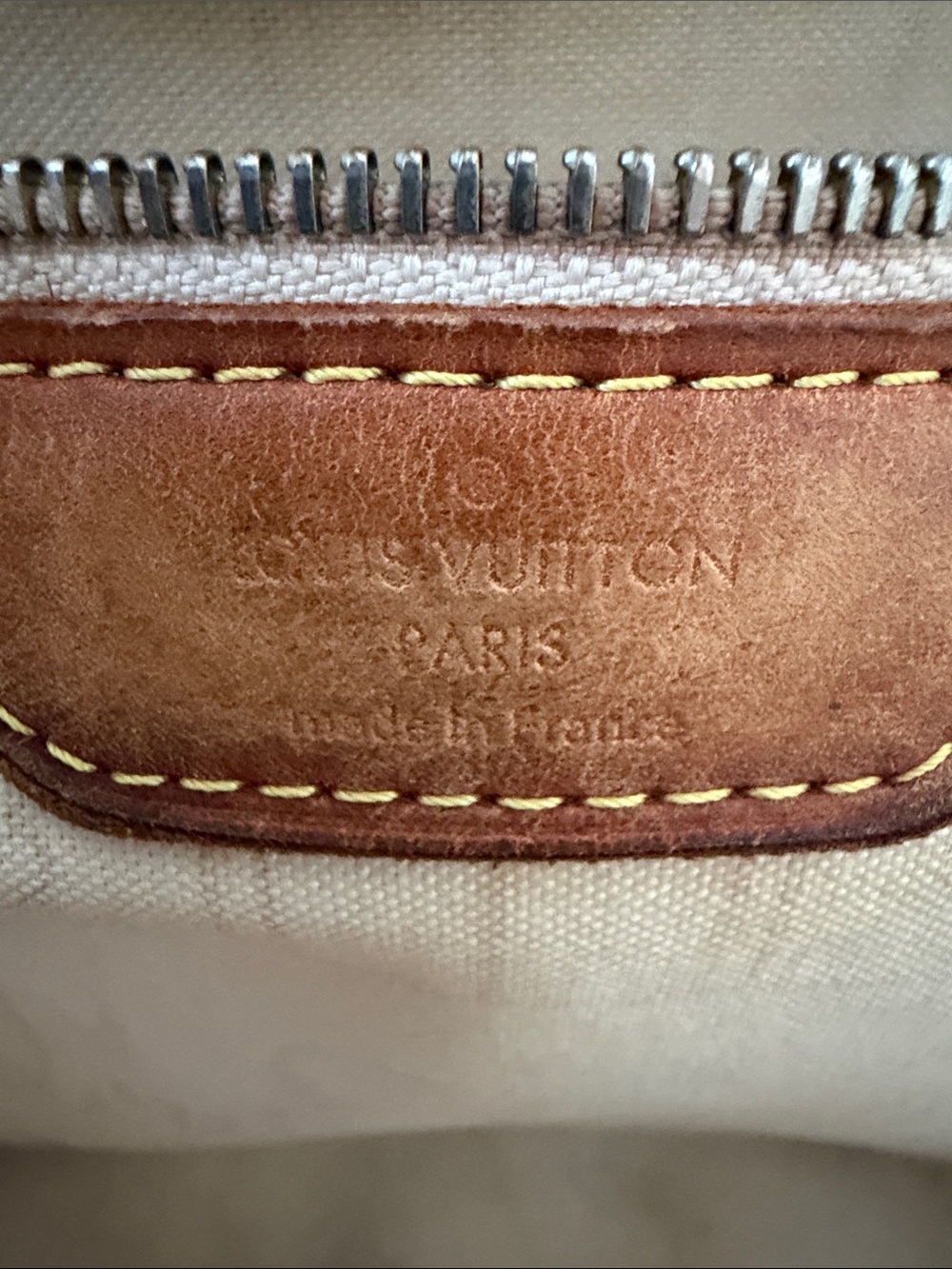 LV Neverfull MM. All straps intact. Pen and water marks as seen.